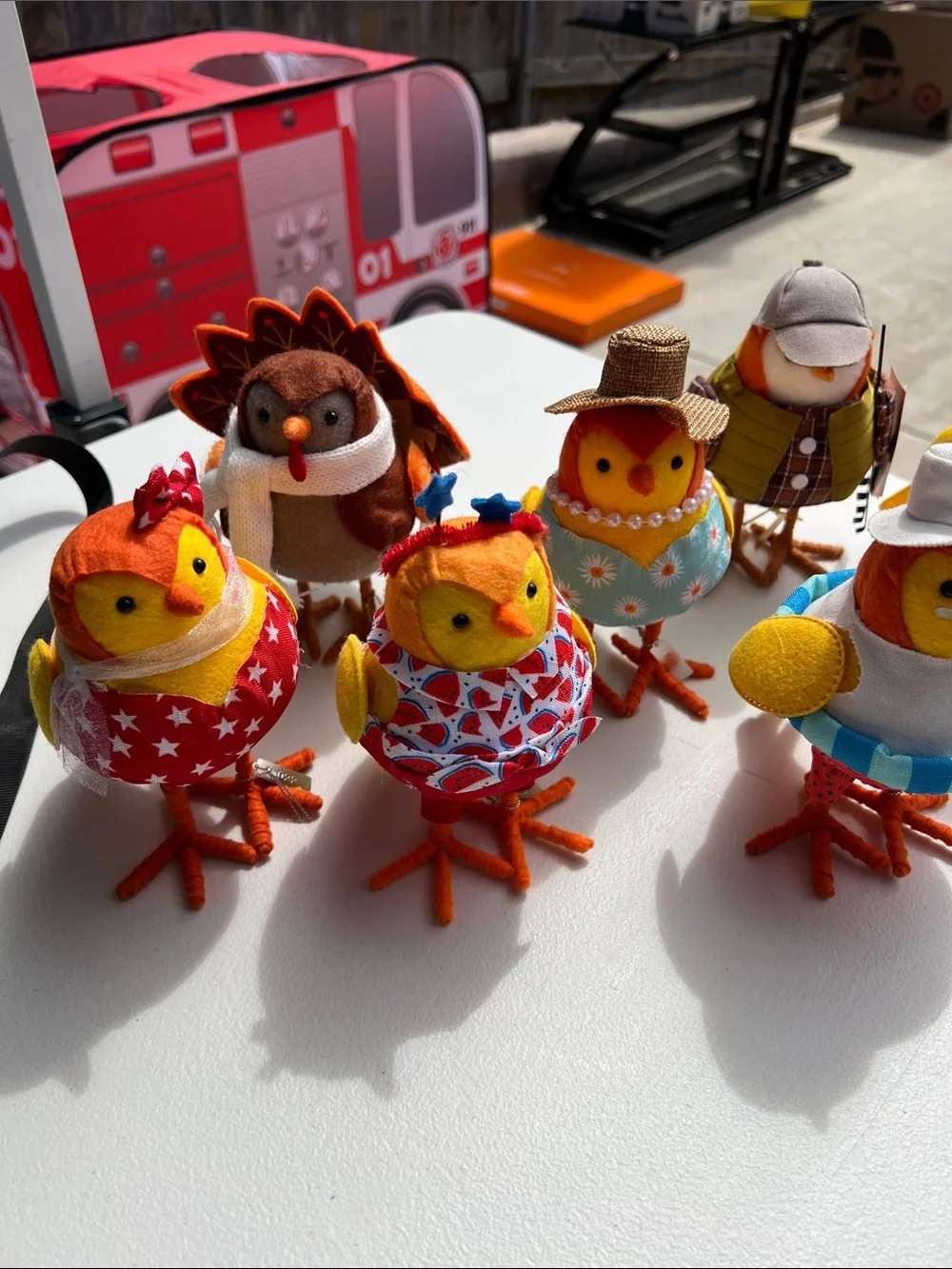 Target Plush Chick Figurines in Orange, Red, Yellow and Blue